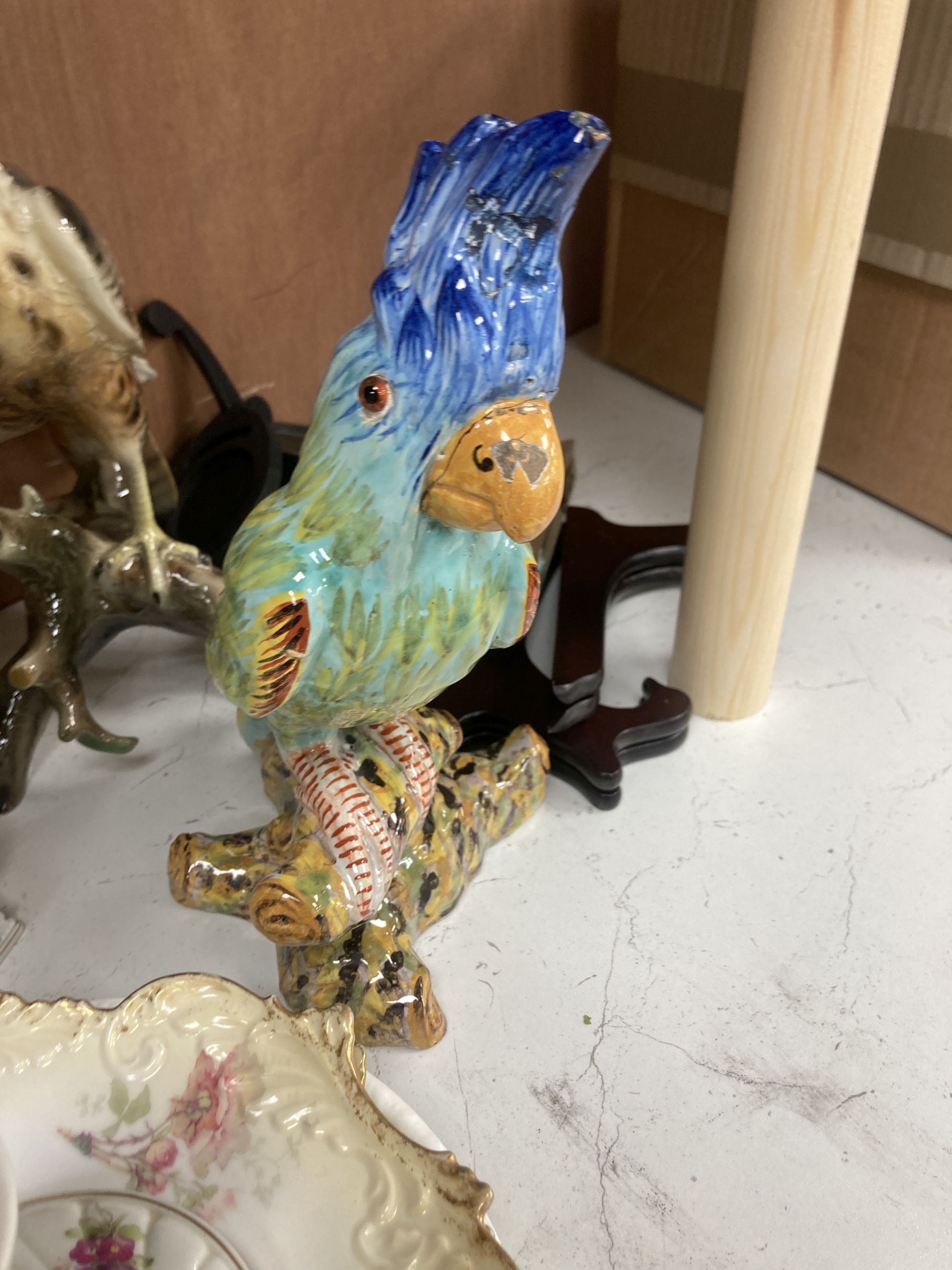 A collection of figurines, cabinet cups plates, two boxes, etc.